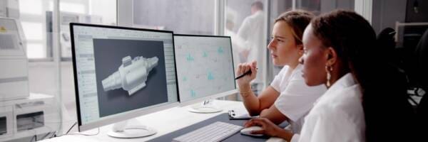 Engineer Using 3d Computer To Develop Parts