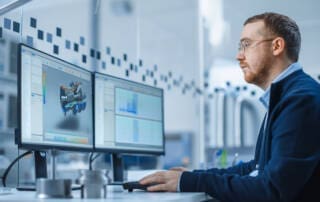 Industrial Engineer Solving Problems Working On Computer