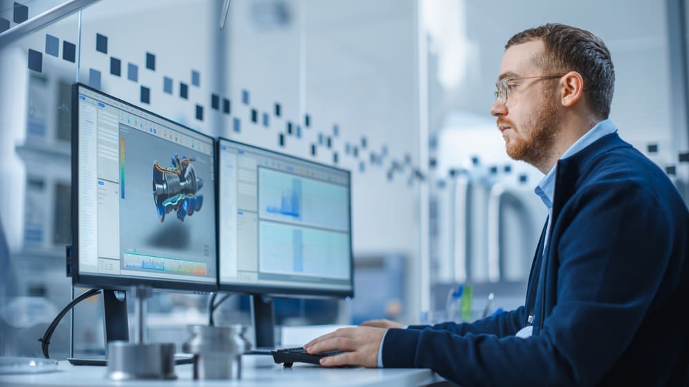Industrial Engineer Solving Problems Working On Computer