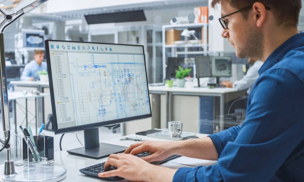 engineer looking at drawings