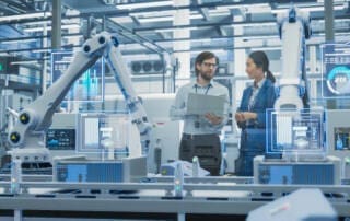 Electronics Factory Assembly Line Digitalization: Automated Robot Arms Manufacturing Equipment. Managers Discussing Work while Futuristic AI Computer Vision Analyzing, Scanning Conveyor Line